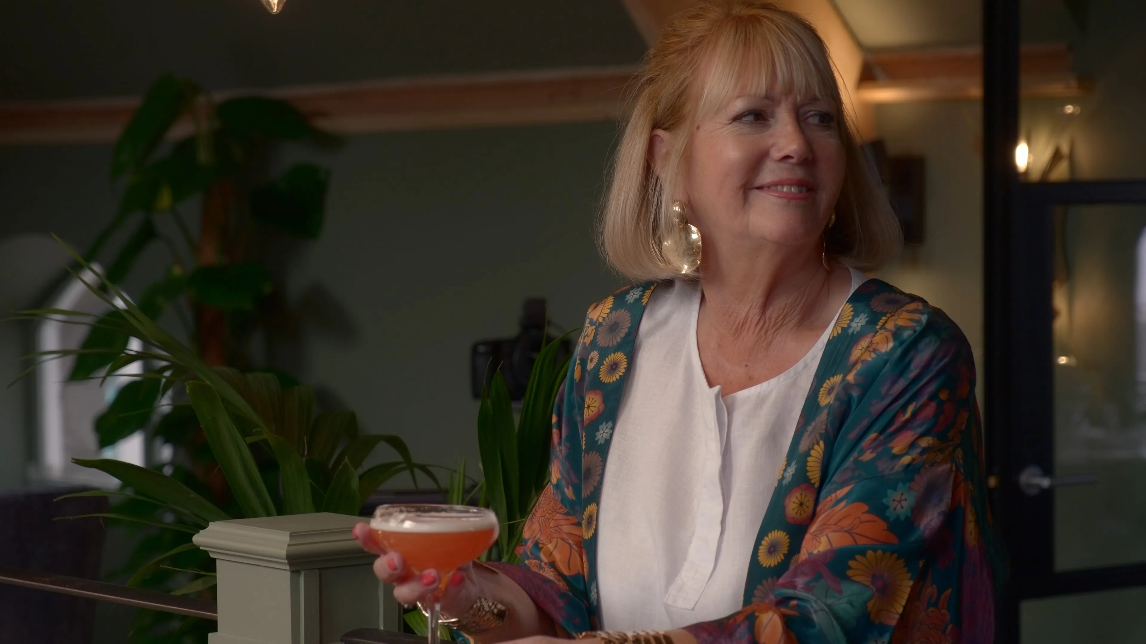 
A guest holding a cocktail at Kellas, the hospitality venue at Manxonia House in Port St Mary, Isle of Man